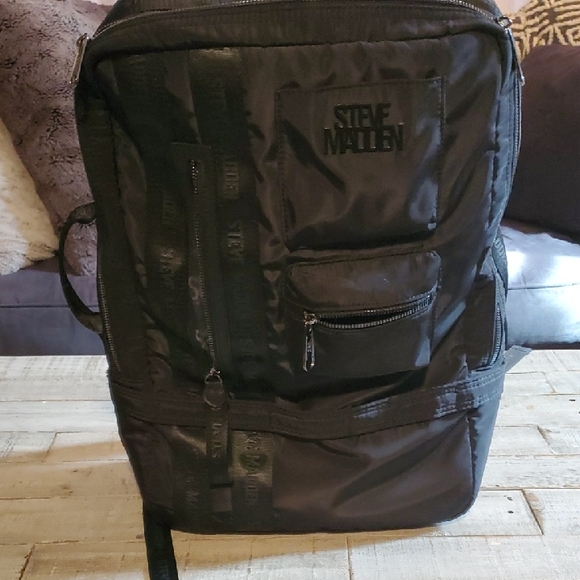 Steve Madden Black Backpack with Front Zip Pockets Can Be Carried As Brief Case